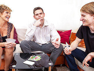 This cougar does two toyboys on her couch