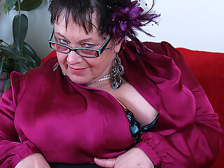 Huge breasted British mature BBW playing all by herself