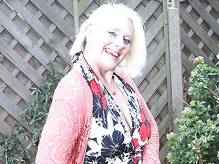 Naughty British housewife playing in the garden