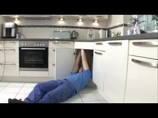 Plump housewife helps plumber