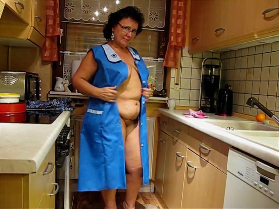 Mature German Lady Trying On Aprons