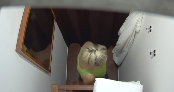 Busty mature blonde in a massage parlor